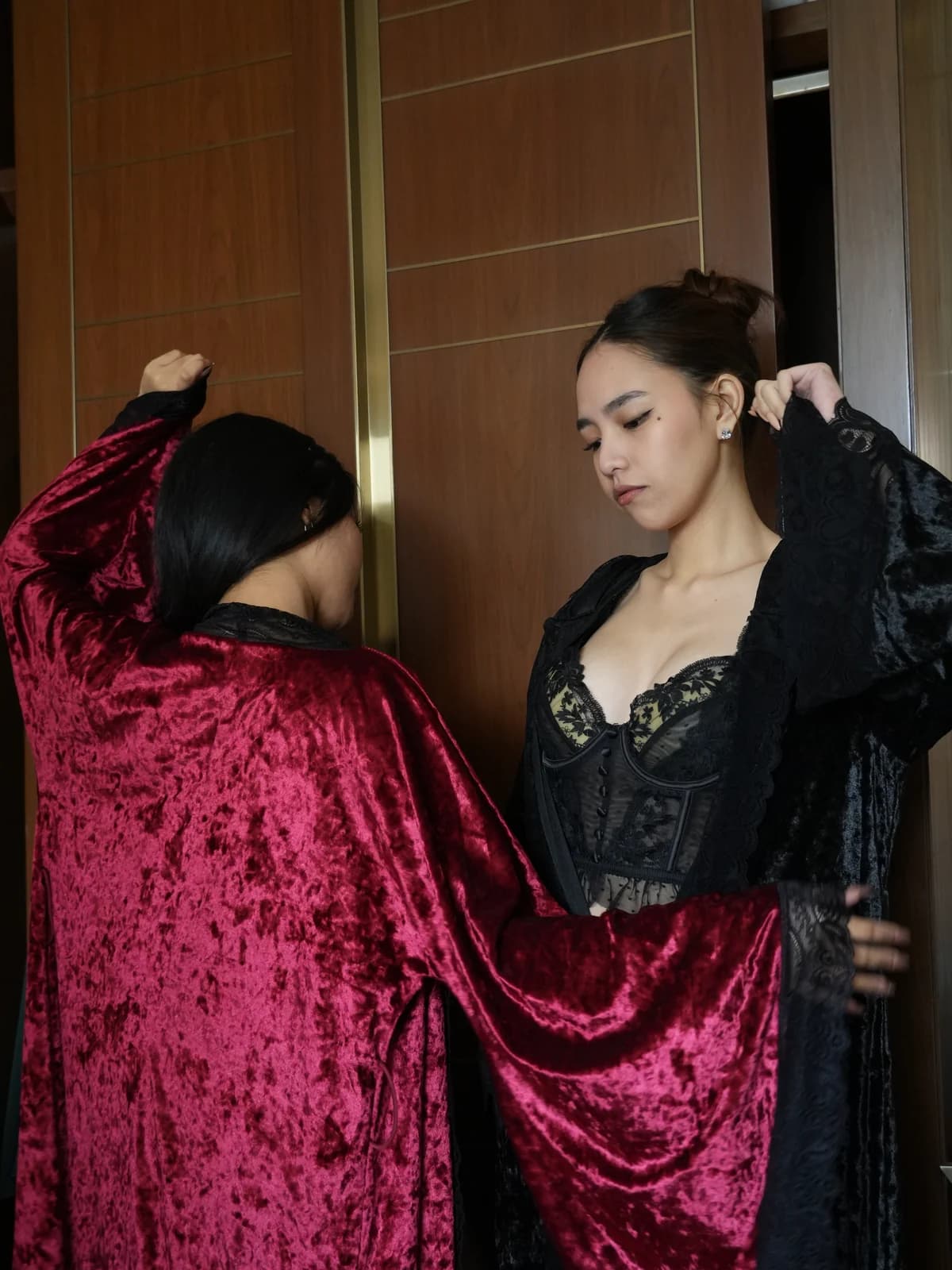 Merchant campaign preview: two models in contrasting velvet robes and lace sets