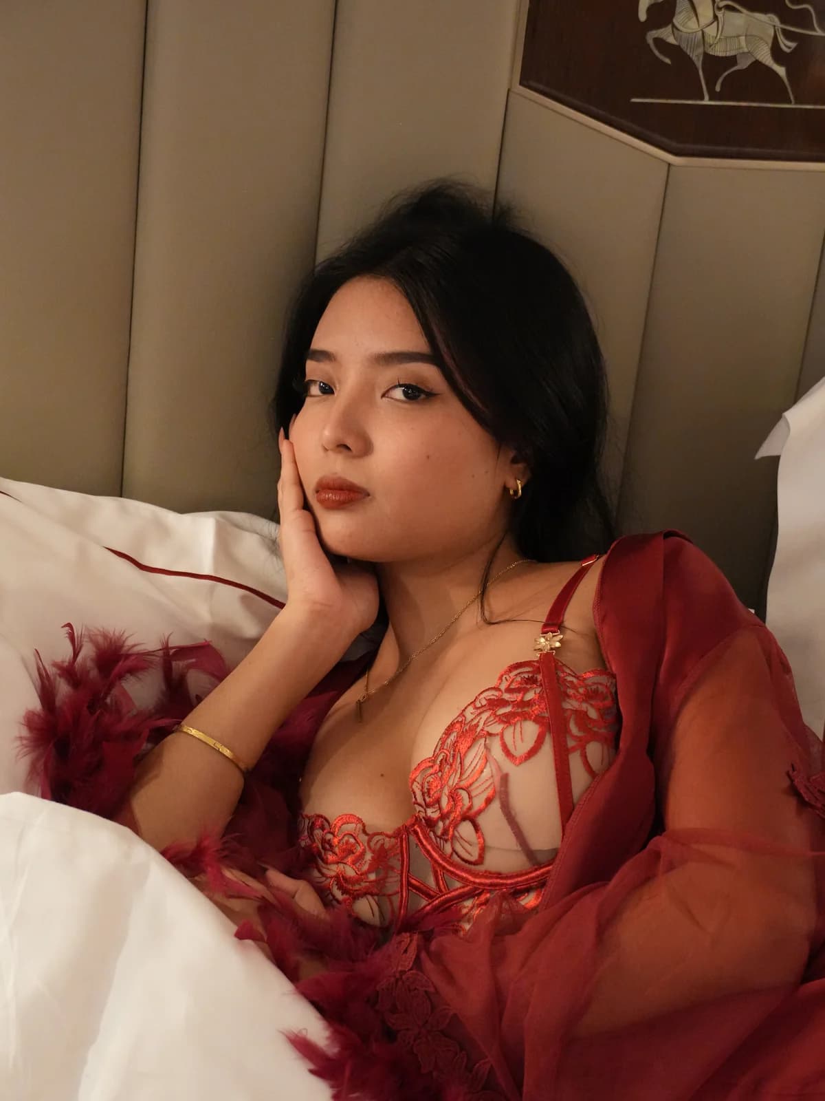 Merchant campaign preview detail: red floral lace and sheer robe texture