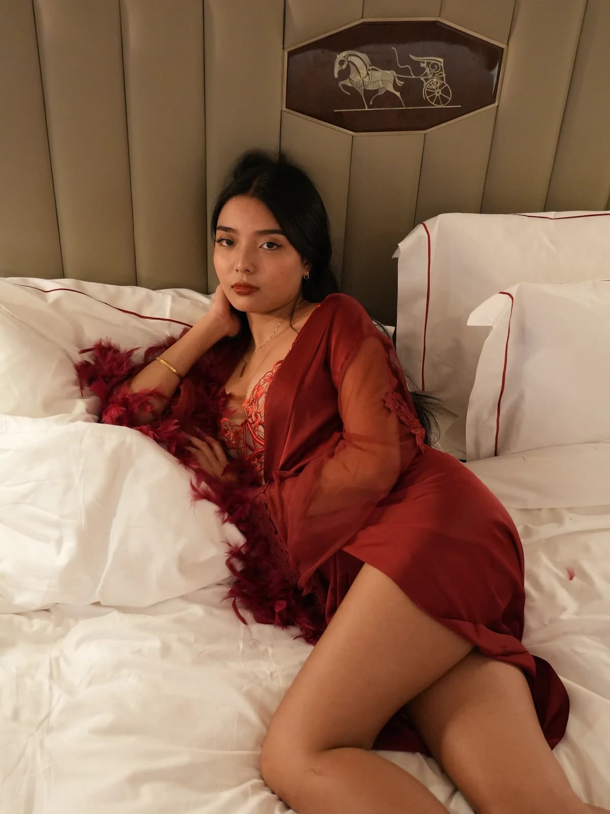 Merchant campaign preview: model in a scarlet lace set and sheer red robe